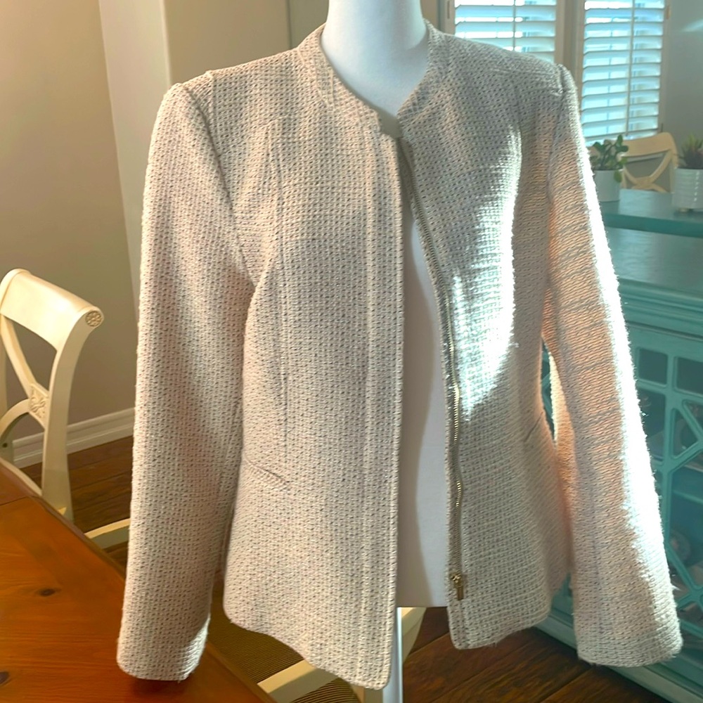 Calvin Klein cream lined blazer. Zipper on front. Worn twice